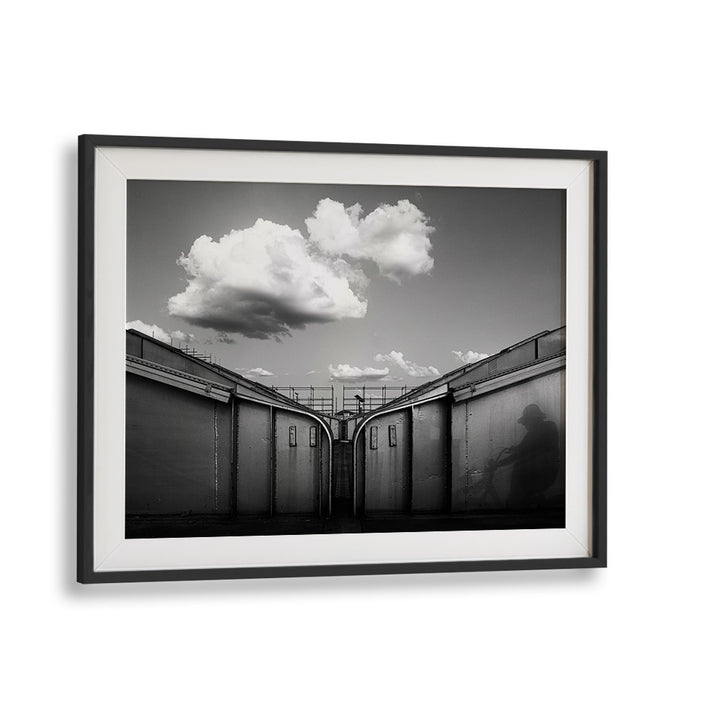 "ON THE BRIDGE, PHOTOGRAPHY PRINTS captures urban life with striking contrasts and serene clouds in a stunning frame."