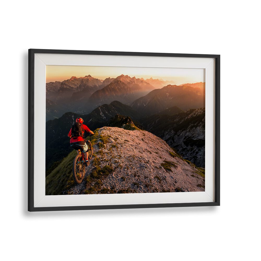 Mountain biker navigating the stunning terrain at sunset, showcasing RIDING RIDGE SINGLETRACK, PHOTOGRAPHY PRINTS.