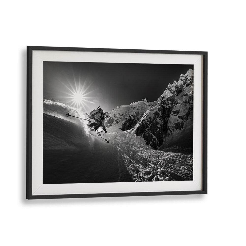 Dynamic skiing action captured in SNOW SPLASH OVER THE EDGE, PHOTOGRAPHY PRINTS, showcasing thrilling winter sports.