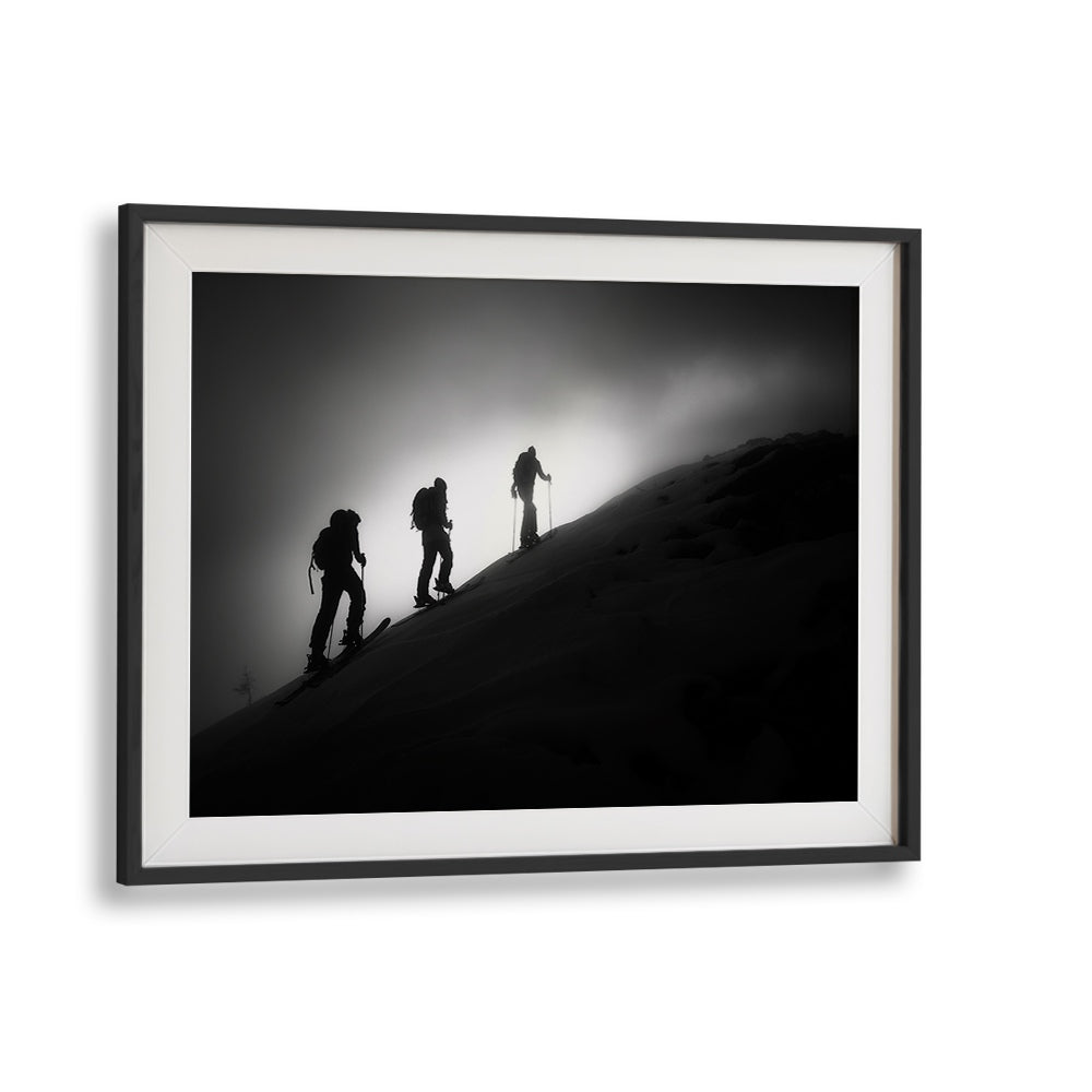Stunning STEP BY STEP , PHOTOGRAPHY PRINTS showcasing skiers ascending a mountain in dramatic black and white.