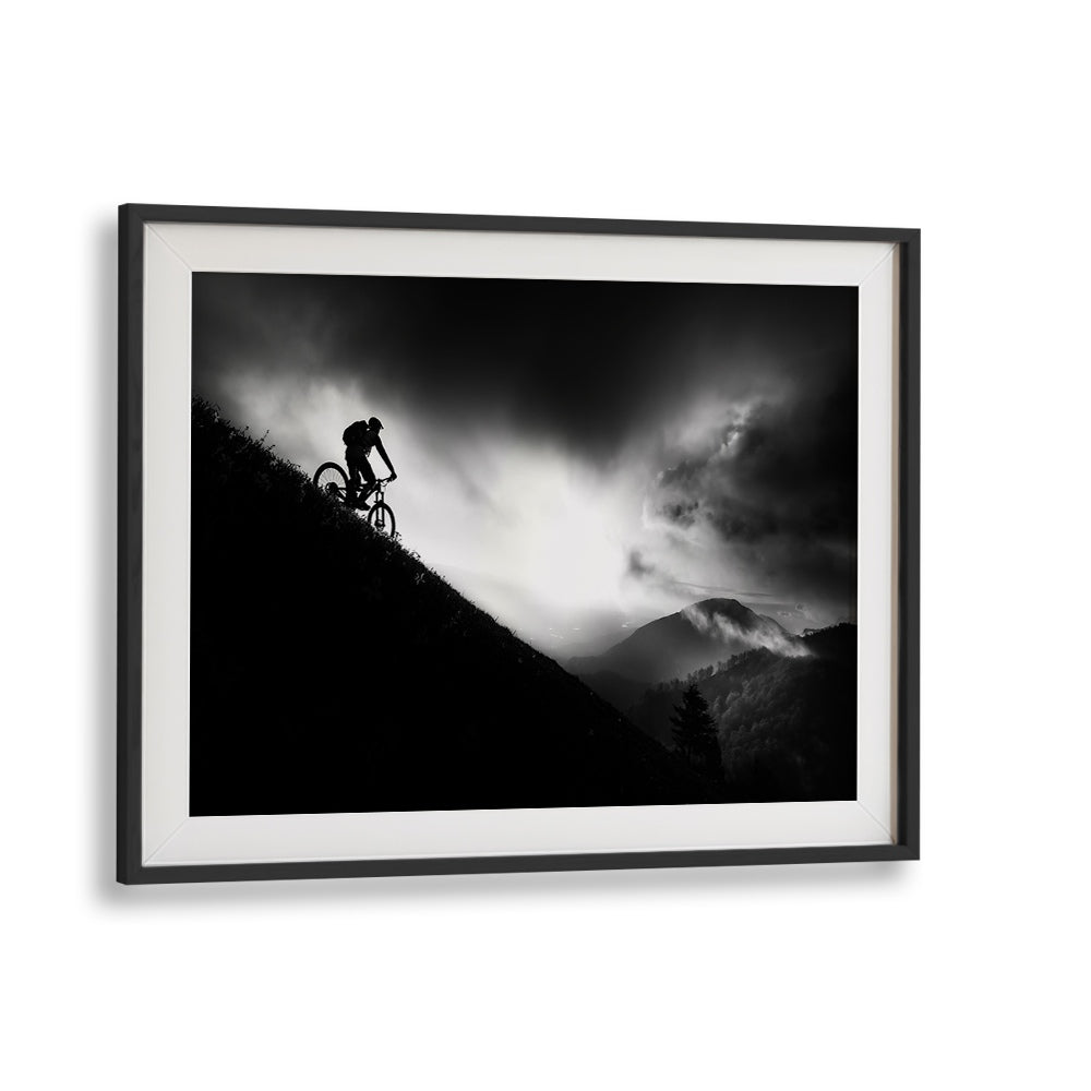 Stunning black and white depiction of a cyclist at dawn, part of the SUNRISE RIDE, PHOTOGRAPHY PRINTS collection.