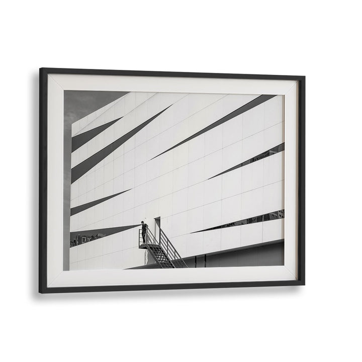 Discover urban artistry with UNTITLED IX, PHOTOGRAPHY PRINTS showcasing sleek architectural lines and striking contrasts.