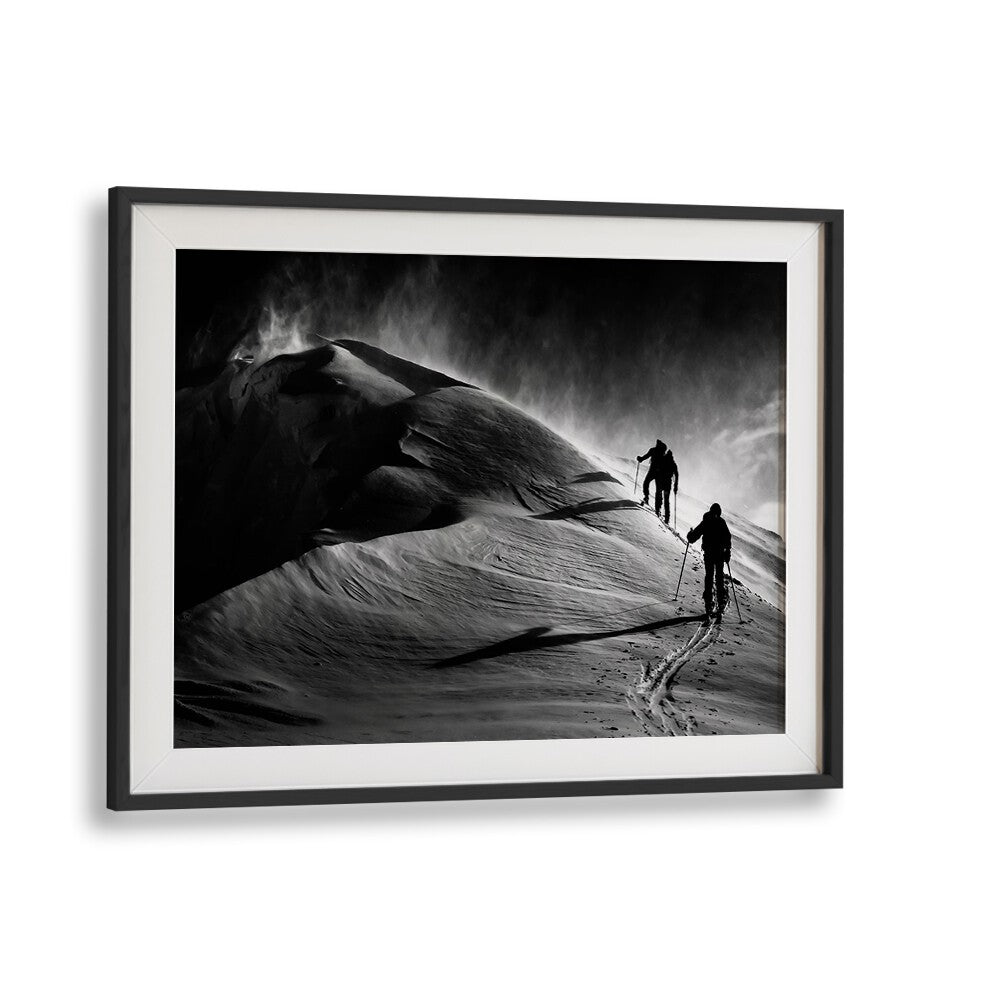 Explore the stunning WINDY MOUNTAIN, PHOTOGRAPHY PRINTS featuring adventurers on a snow-capped peak in black and white.