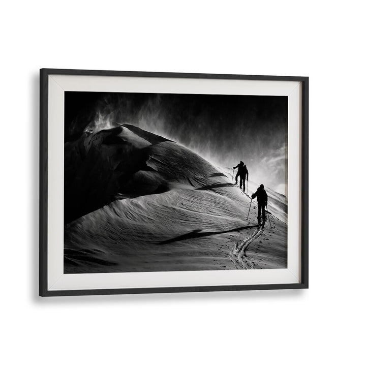 Explore the stunning WINDY MOUNTAIN, PHOTOGRAPHY PRINTS featuring adventurers on a snow-capped peak in black and white.
