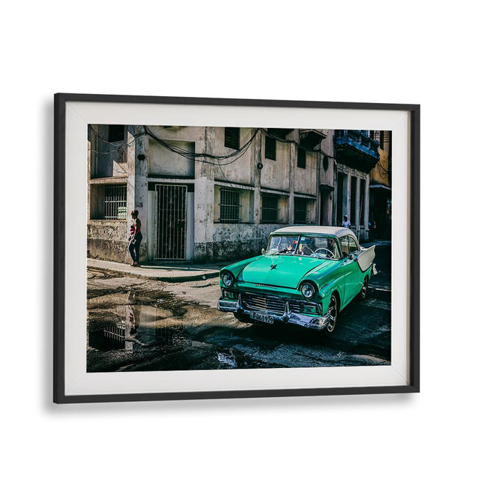 Vivid street scene featuring a classic green car, showcasing HABANA STREET IV, PHOTOGRAPHY PRINTS collection.