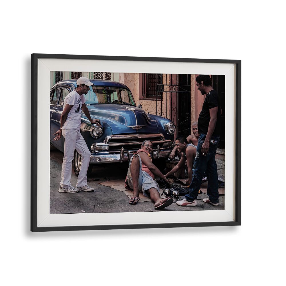 Repairing a car with friends showcases urban grit in our REPAIRING A CAR, PHOTOGRAPHY PRINTS collection.