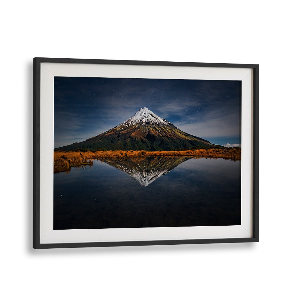 Stunning MOUNT TARANAKI - A STARRY NIGHT, PHOTOGRAPHY PRINTS reflecting a tranquil landscape under a starry sky.