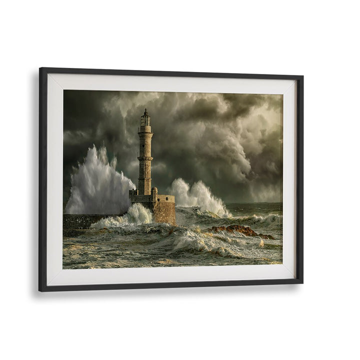 Dramatic waves crash against the lighthouse in CHANIA STORM, stunning photography prints for nature lovers.