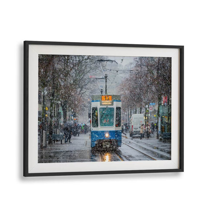 Tram in snowy Zurich, capturing the serene beauty of MORNING IN ZURICH, PHOTOGRAPHY PRINTS for your home decor.