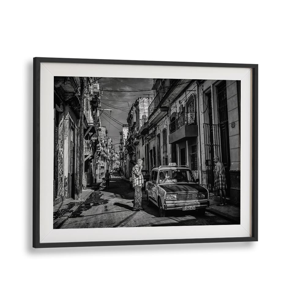 Explore HABANA STREET VII, PHOTOGRAPHY PRINTS, showcasing vibrant urban life in a captivating black-and-white scene.
