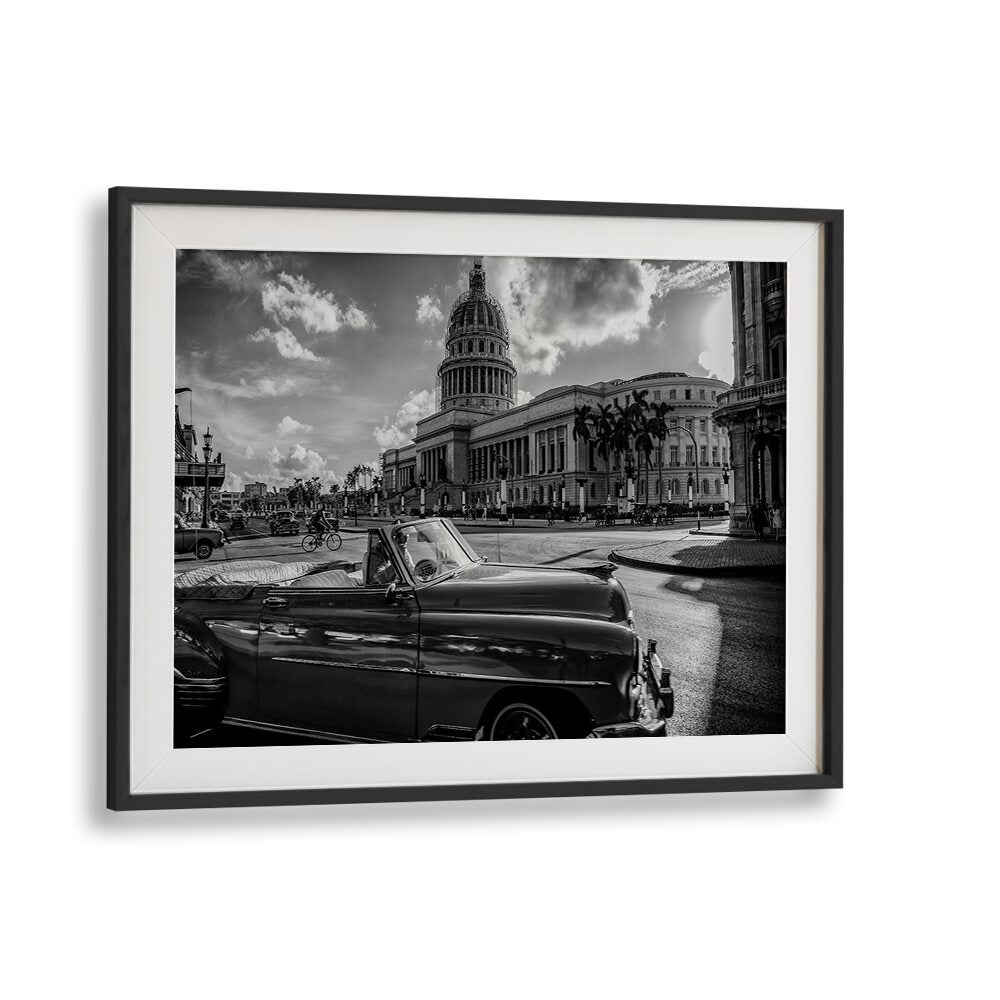 EL CAPITOLIO, PHOTOGRAPHY PRINTS showcases a classic car against a stunning urban backdrop, capturing vibrant city life.