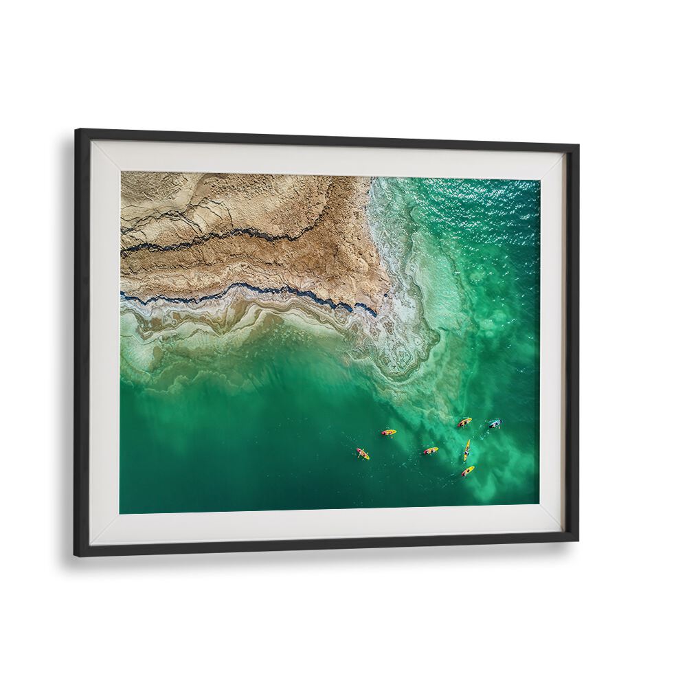 Aerial view showcasing kayakers on the vibrant waters of the Dead Sea, part of DEAD SEA EXPLORATION, PHOTOGRAPHY PRINTS.