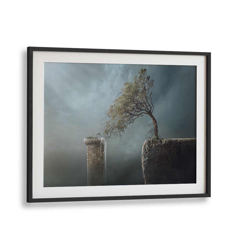 Surreal "Drink Water" photography prints featuring a tree atop a rocky landscape, perfect for artistic decor.
