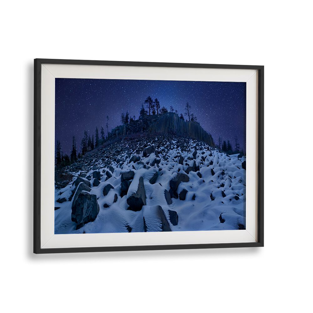 Stunning COLD MOUNTAIN DEVILS POSTPILE photography prints showcase a snowy landscape under a starry night sky.