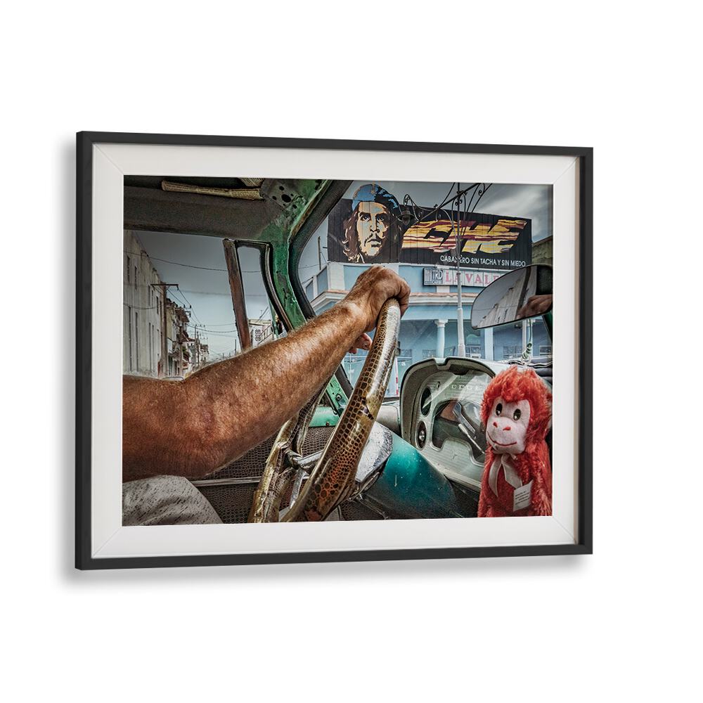 Street photography print featuring Che and the Taxidriver, capturing urban life and vibrant storytelling.