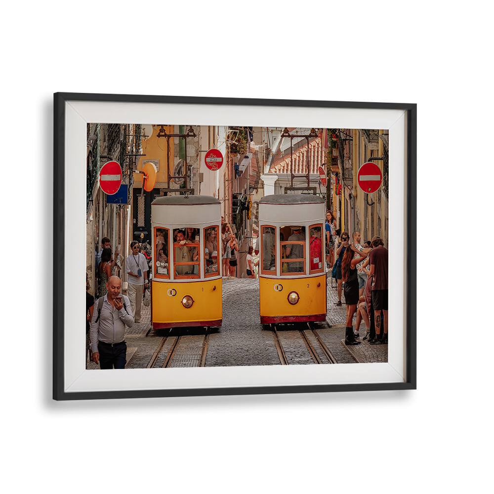 Colorful trams navigate a bustling street, showcasing urban life in our TRAMS, PHOTOGRAPHY PRINTS collection.