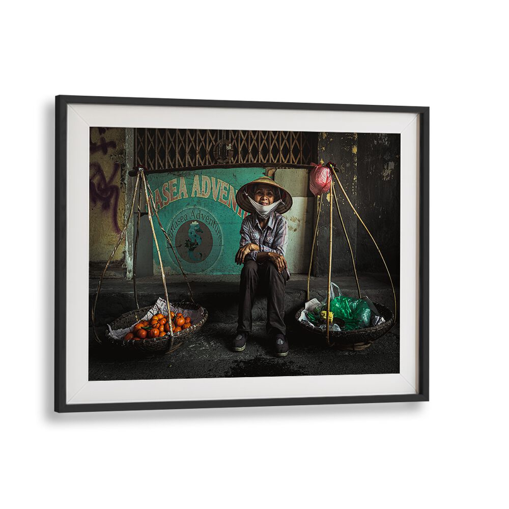 Vibrant scene from Hanoi's street market featuring a vendor, perfect for HANOI STREET MARKET, PHOTOGRAPHY PRINTS.
