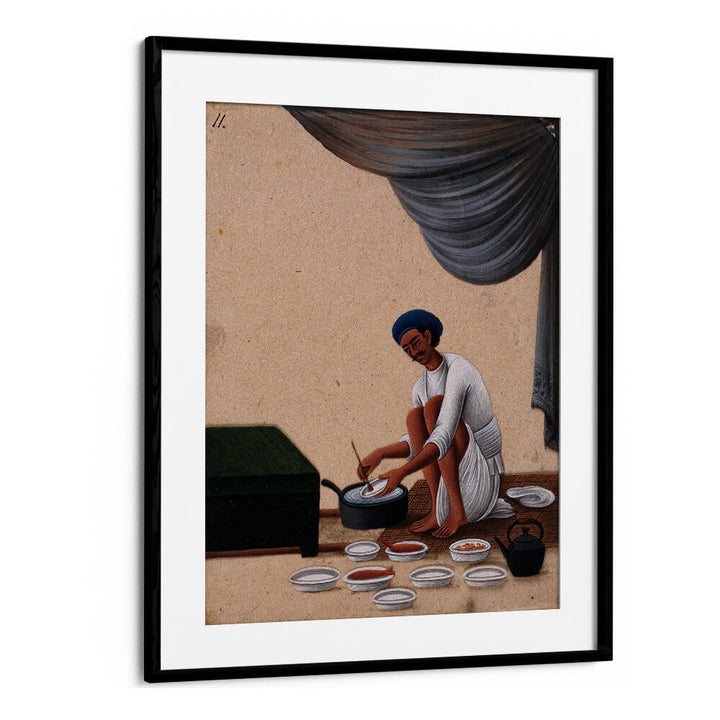A MAN WASHING DISHES