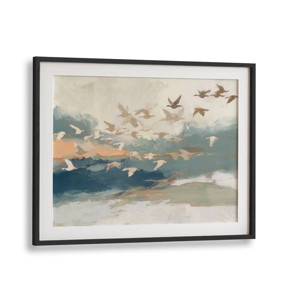 BIRDS IN FLIGHT AT DUSK OVER OPEN WATER