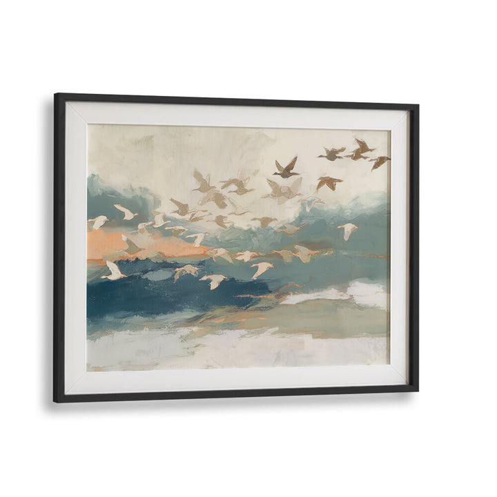 BIRDS IN FLIGHT AT DUSK OVER OPEN WATER