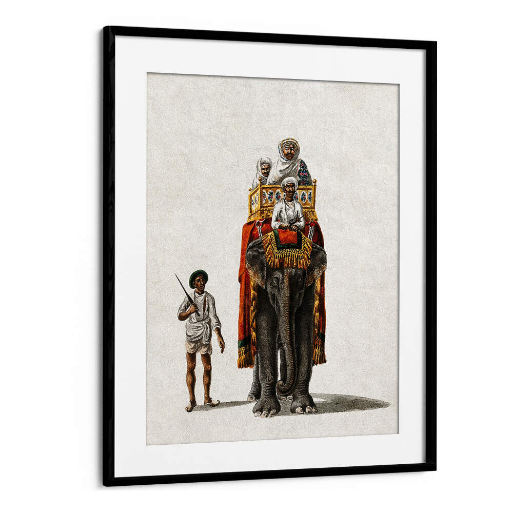 TWO MEN RIDING ON A ELEPHANT