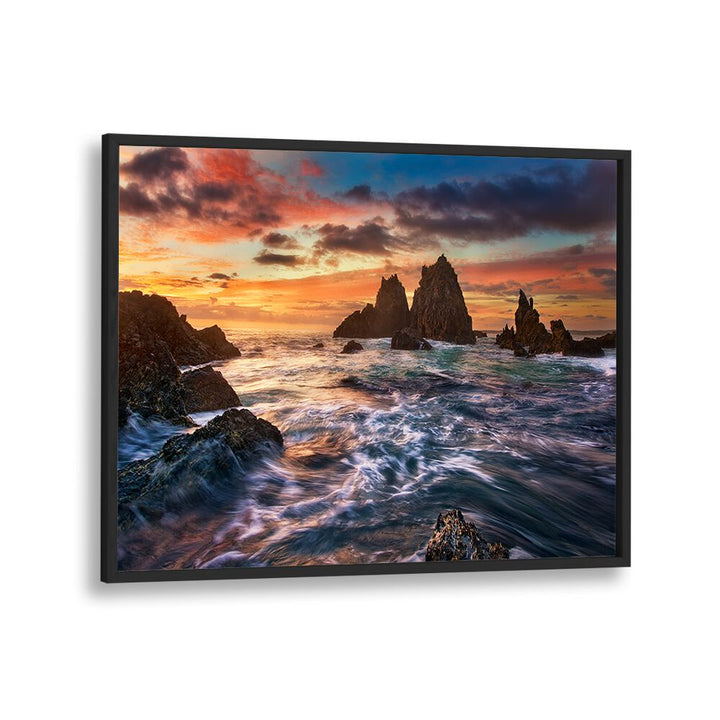 Stunning sunset over rocky coastline showcased in DANCE WITH LIGHT, PHOTOGRAPHY PRINTS to illuminate your space.