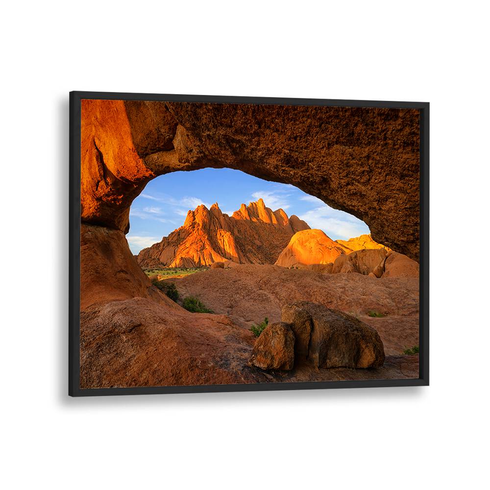 Stunning SPITZKOPPEN, PHOTOGRAPHY PRINTS showcasing breathtaking landscapes through a natural rock arch.