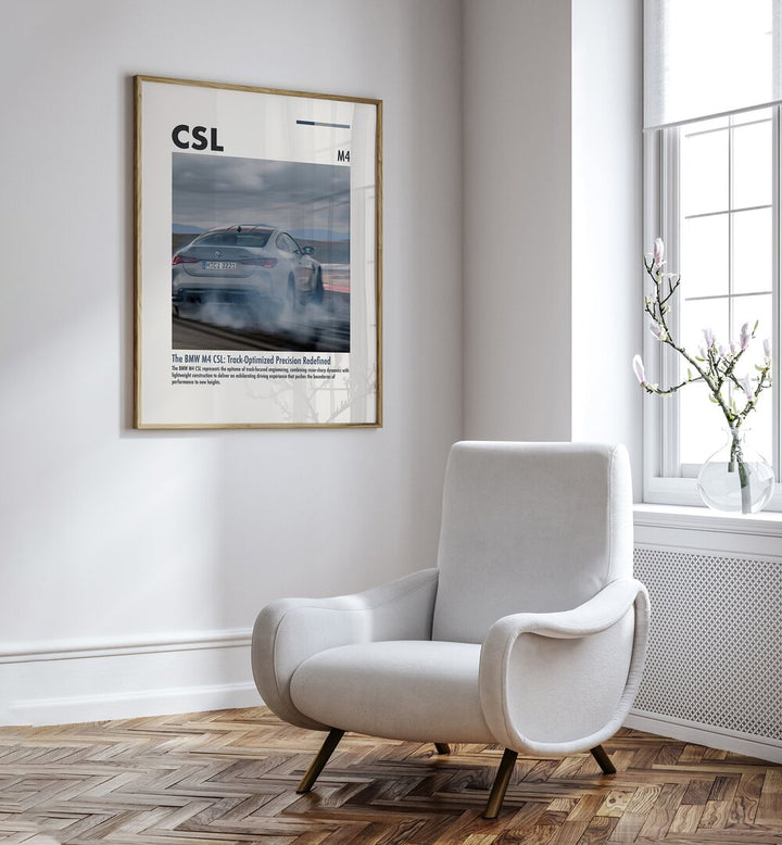 BMW M4 CSL I Car Posters Automotive Wall Art Prints in Oak Wood Plain Frame placed on a White Colored Wall near a White Sofa Chair in the Drawing Room