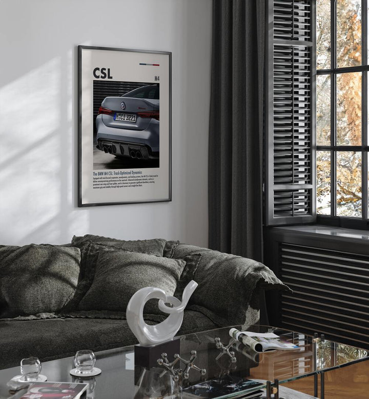 BMW M4 CSL IV Car Posters Automotive Wall Art Prints in Black Plain Frame placed on a White Colored Wall near a Grey Sofa in the Living Room