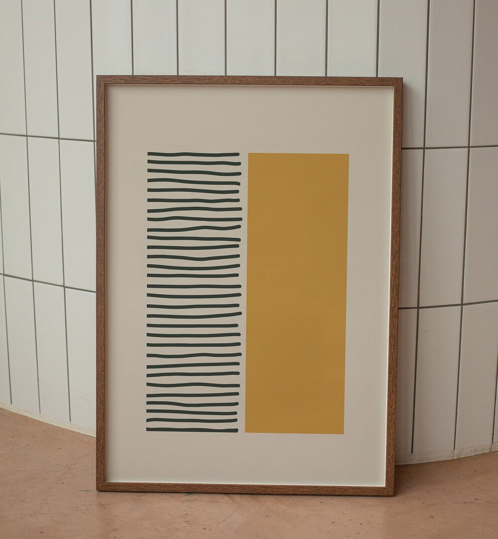 Bold Yellow And Black Stripes Geometric Art Painting Artwork in plain oakwood frame leaning on a white wall