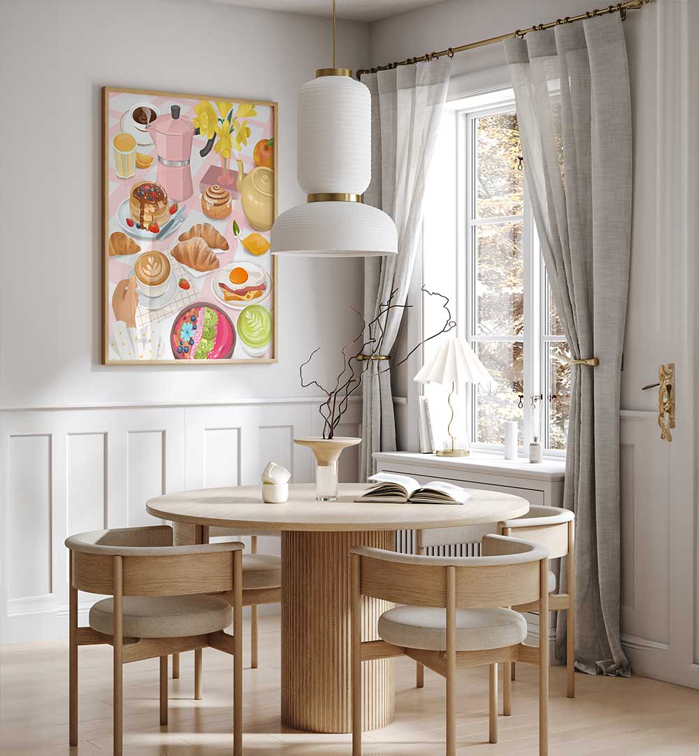 BREAKFAST & BRUNCH kitchen posters art in a bright dining room with a round wooden table.