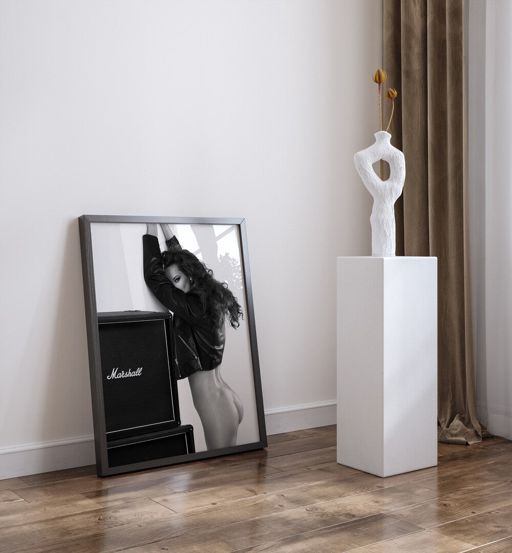 Baby by David Drake Fine Art Photography Fashion Photography in Black Plain Frame placed on the floor beside a art piece