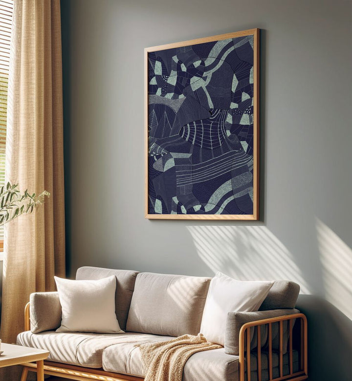 Bakiro Abstract Art Abstract Paintings in Oak Wood Plain Frame placed on a Grey Colored Wall near a Beige Sofa in the Living Room