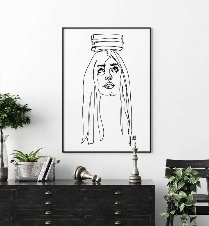 Balancing Act I by Hanna Lee Tidd Line Art Paintings Line Art Prints in Black Plain Frame placed on a wall behind a console table