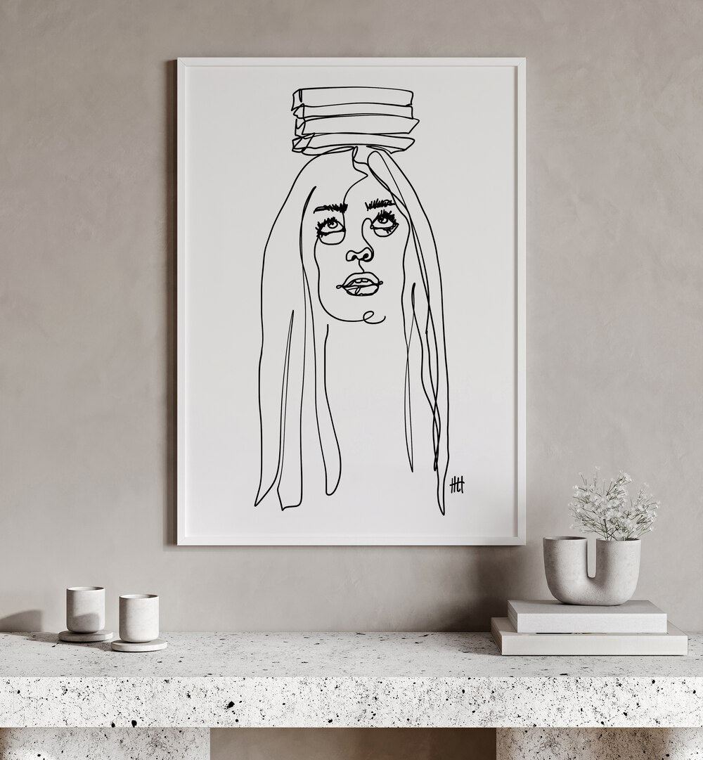 Balancing Act I by Hanna Lee Tidd Line Art Paintings Line Art Prints in White Plain Frame placed on a wall behind a table