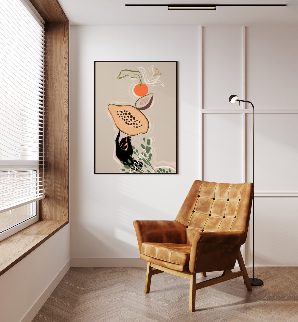 Balancing Fruits By Arty Guava Wall Art Prints in Black Plain Frame placed on a Cream Colored Wall in the Drawing Room