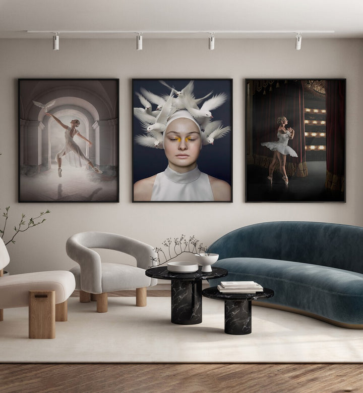 Ballerina Framed Wallart Set Of 3 Paintings in Black Plain Frame placed on wall behind a blue sofa and a white chair