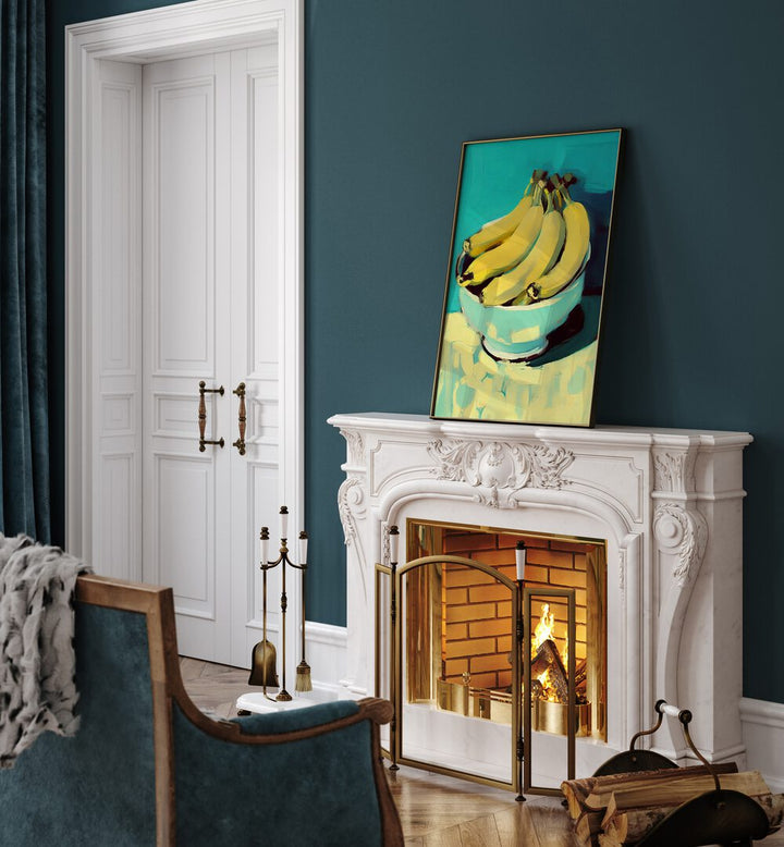 Bananas By Treechild Kitchen Art Prints in Black Plain Frame placed on a Shelf above a Fire Place near a Blue Colored Wall in the Drawing Room