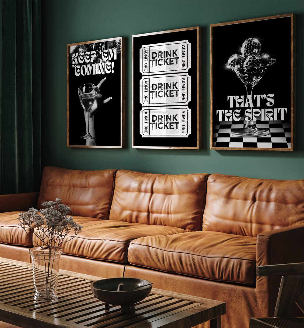 Bar Set Set Of 3 Paintings in Dark Wood Plain Frame placed on a living room wall behind a sofa