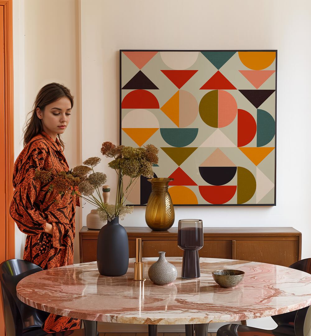 Bauhaus Modern By Ana Rut Bre Abstract Art Abstract Paintings in Black Plain Frame placed on a Cream Colored Wall near a Dining Table in the Dining Room