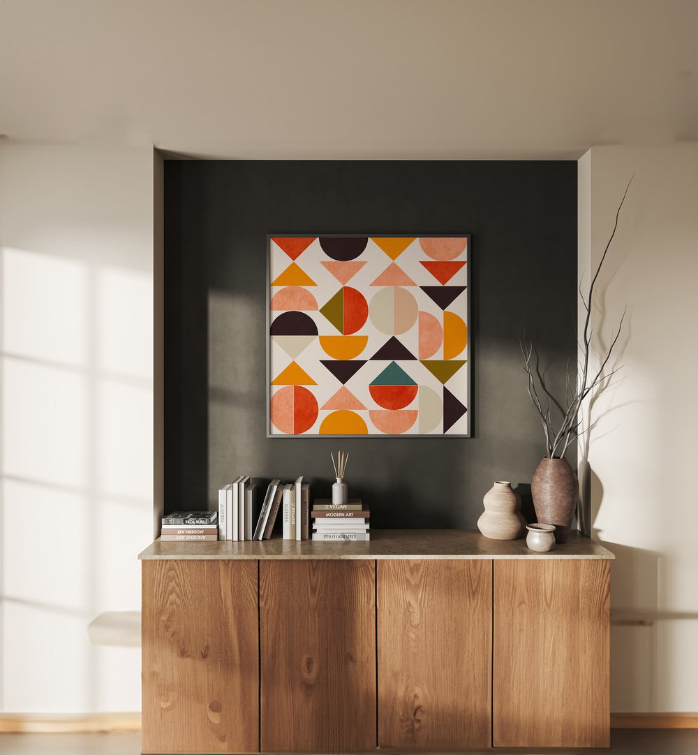 Bauhaus New VIII By Ana Rut Bre Abstract Art Abstract Paintings in Black Plain Frame placed on a Dark Grey Colored Wall above a Console Table in the Living Room 