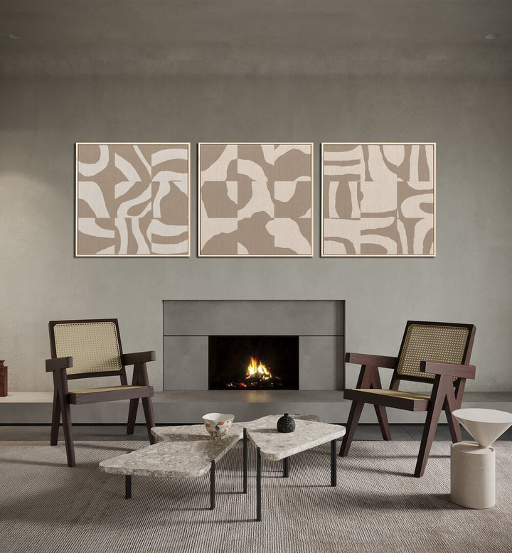 Beige Monochromes Set Set Of 3 Paintings in Oak Wood Plain Frame placed on a wall above the hearth behind chairs