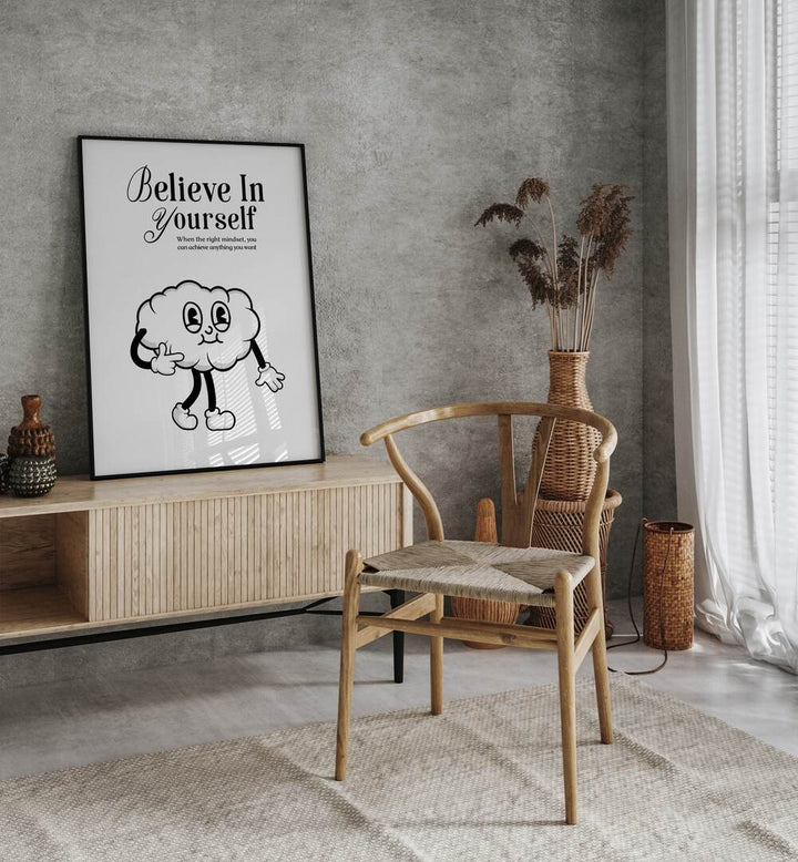 Believe in Yourself a Visual Anthem of Empowerment Quotes and Typography Posters in Black Plain Frame placed on a wall behind a console table