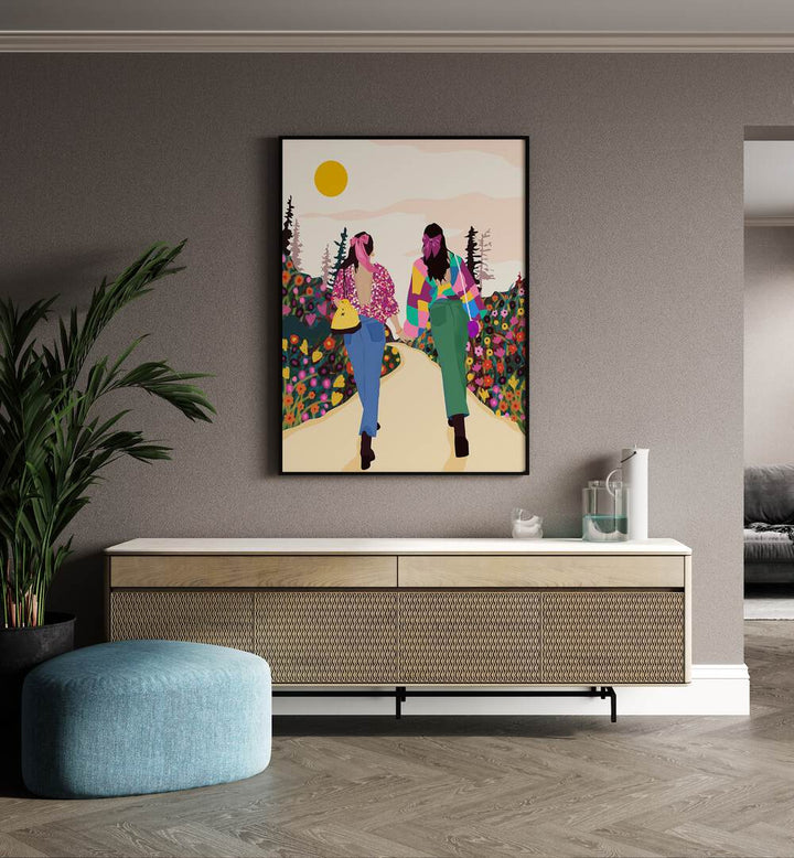 Besties  By Uma Gokhale Woman Illustration Paintings in Black Plain Frame on a beige wall above a console table 