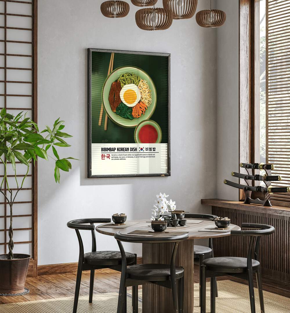 Bibimbap by Studio Mandariini Kitchen Posters Kitchen Art Prints in Black Plain Frame placed on a wall in a dining room area behind a dining table and beside a window