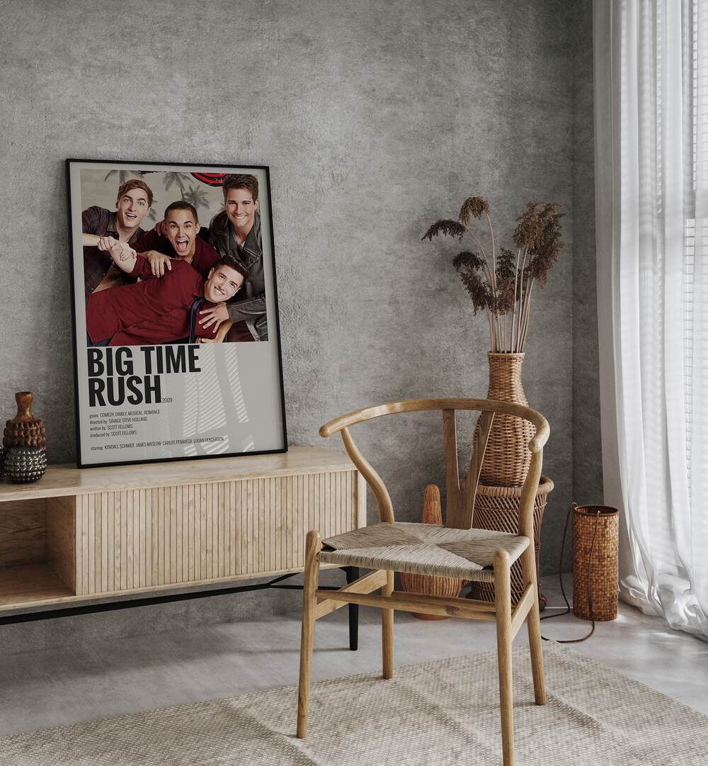 Big Time Rush 2009 Movie Posters in Black Plain Frame placed on a table beside oakwood chair