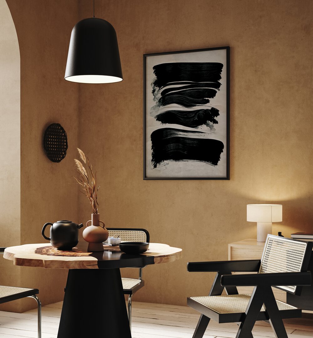 Black Strokes By Treechild Abstract Art Prints in Black Plain Frame placed on a Dessert Brown Colored Wall near a Coffee Table in the Dining Room