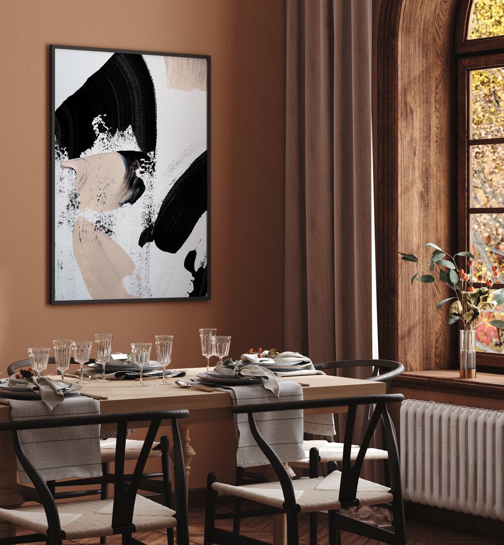 Black and Nude ii by Uplus Me Studio Abstract Art Abstract Paintings in Black Plain Frame placed on a wall behind a dining table for dining area