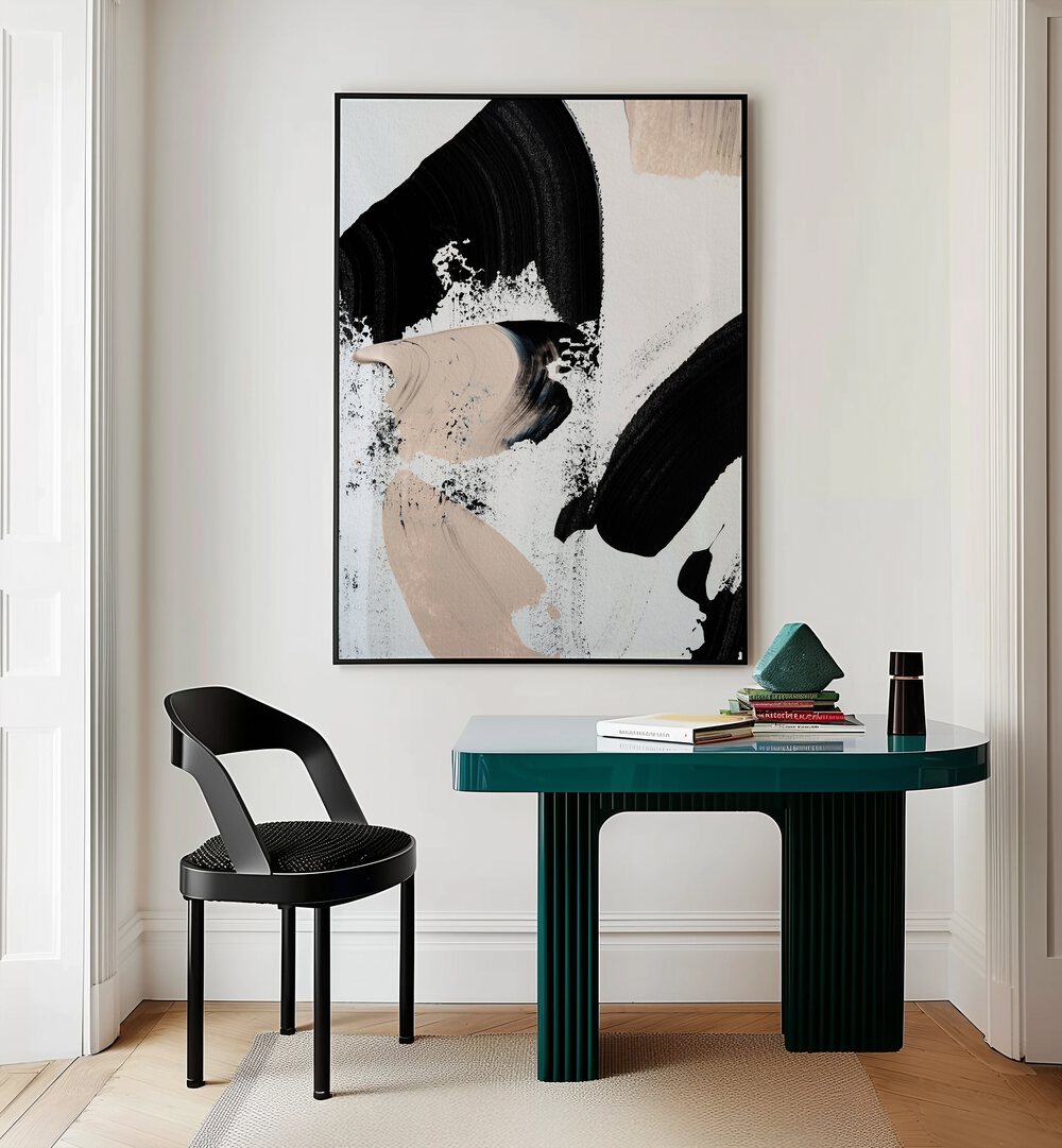 Black and Nude ii by Uplus Me Studio Abstract Art Abstract Paintings in Black Plain Frame placed on a wall behind a study table