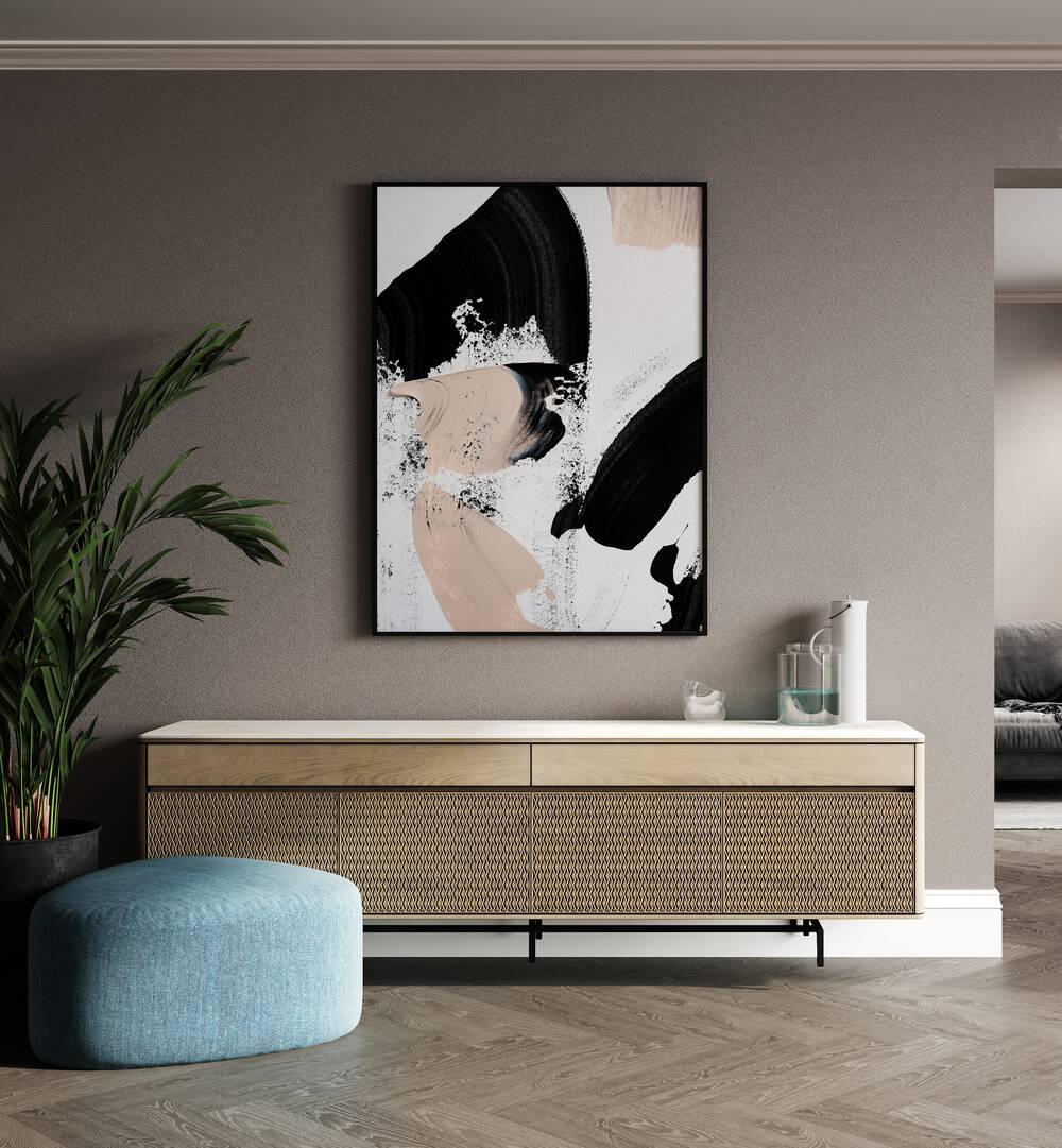 Black and Nude ii by Uplus Me Studio Abstract Art Abstract Paintings in Black Plain Frame placed on a wall behind a console table